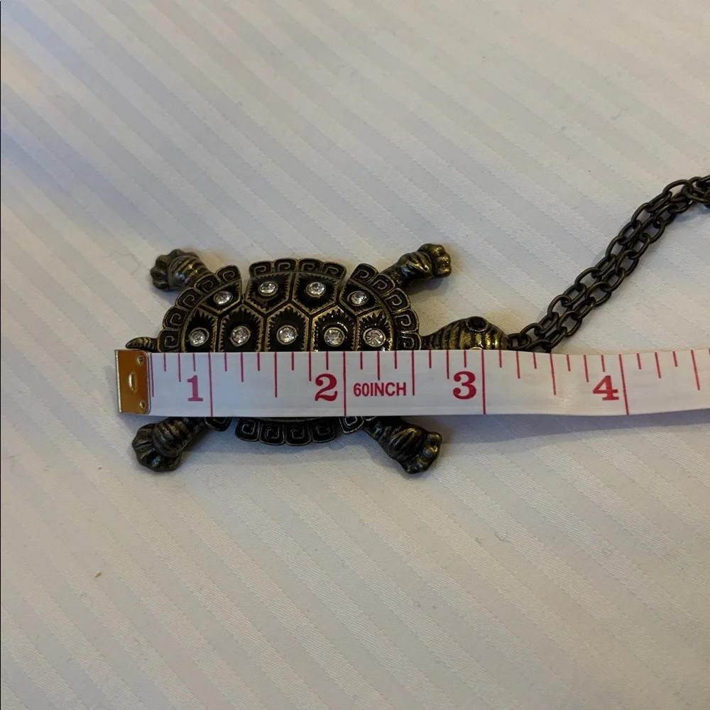 TURTLE NECKLACE EMBELLISHED WITH RHINESTONES LOOKS LIKE BRASS NO MARKINGS